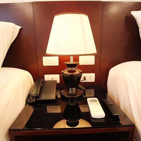 Camellia Hotel Ниньбинь Экстерьер фото