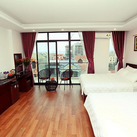 Camellia Hotel Ниньбинь Экстерьер фото